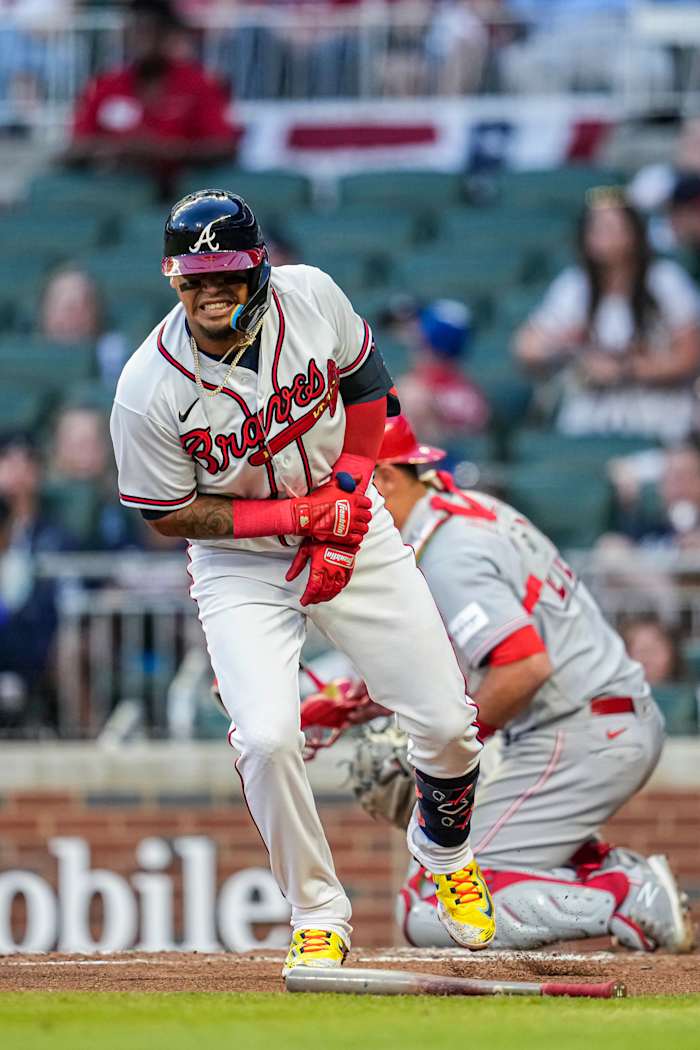Apr 12, 2023; Cumberland, Georgia, USA; Atlanta Braves shortstop Orlando Arcia (11) reacts after being hit by a pitch against the Cincinnati Reds during the second inning at Truist Park. Mandatory Credit: Dale Zanine-USA TODAY Sports